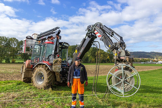 Huddig 1260C i arbete (ledning/demontering). Foto av DanielSchweier, licens CC BY-SA 3.0 via Wikimedia Commons.