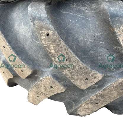 Däck på fälg 600/65-34 höger fram 50% mönster | Huddig 1160D Fälg och däck