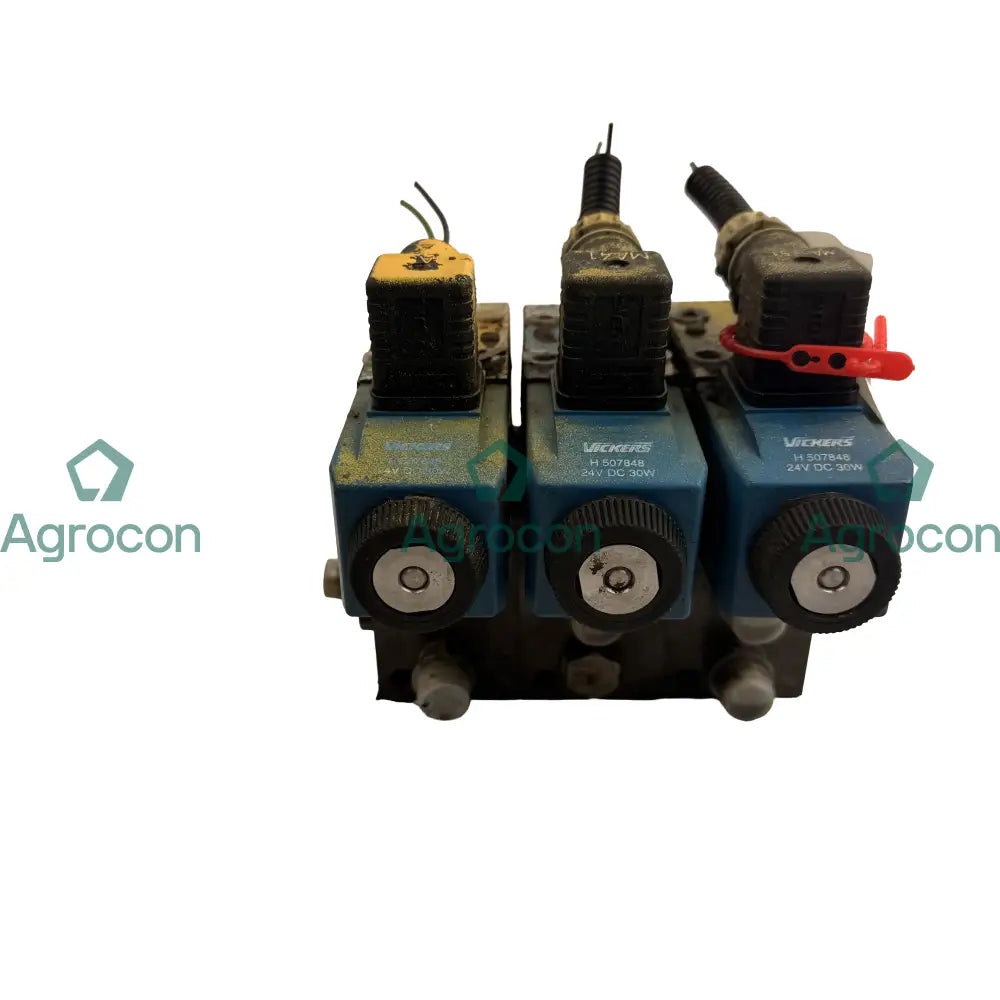 Kopplingsblock med elmagnet | 4974291 | Volvo L90C - Hydraulventil